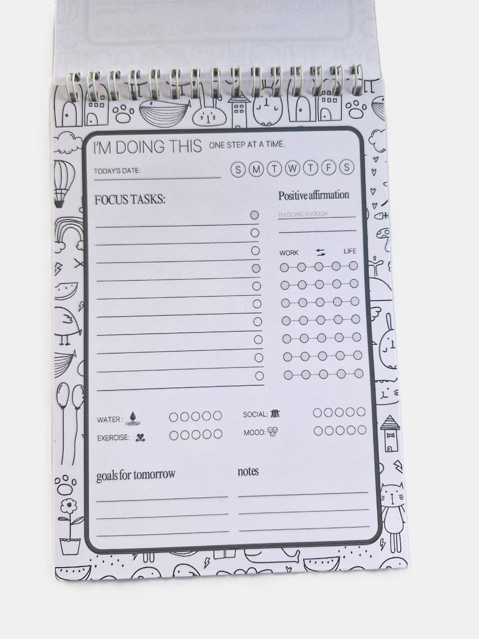 Structured daily planning sheet showing priorities, tasks, goals, and wellness trackers.