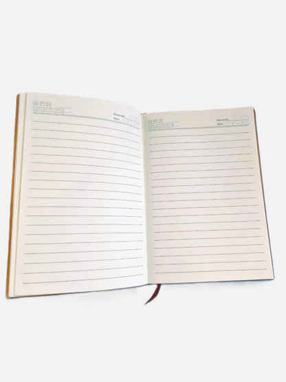 Open undated diary showing clean lined ivory pages designed for everyday writing and journaling