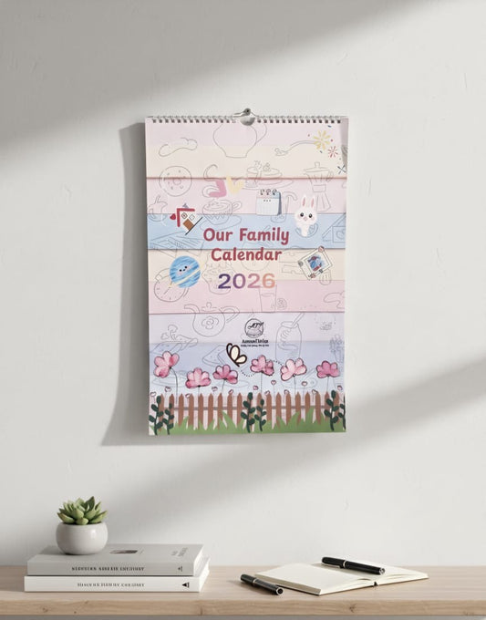 Our Family Calendar 2026 wall calendar hanging on a wall with illustrated cover design.